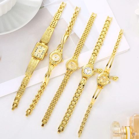 Women Fashion Gold Alloy Quartz Watch Elegant Bracelet Wristwatch With Heart Pendant Hollow Carved Ladies Fashion Jewelry