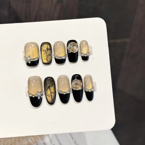 Handgemaakte Zwart Goud Verloop Kattenoog Plaknagels Elegant Bamboe Patroon Strass Kunstnagels Voor Dames Dagelijks