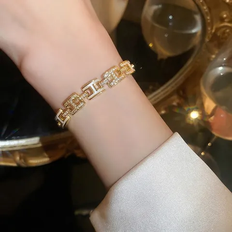 Gold Plated Copper Bracelet With Cubic Zirconia H-Shaped Links And White Enamel Adjustable Slide Clasp For Women Jewelry