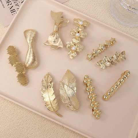 Fermagli Per Capelli Metallo Oro Argento Lega Perla Artificial Farfalla Cuore Stella Foglia Geometrici Eleganti Forcine Moda Donne