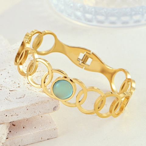 Bohemian 18K Vergoldeter Edelstahl Armreif Für Damen Retro Hohlblatt Geometrisches Design Mit Grünem Rotem Synthetischem Katzenauge Stein Offenes Federarmband Schmuck