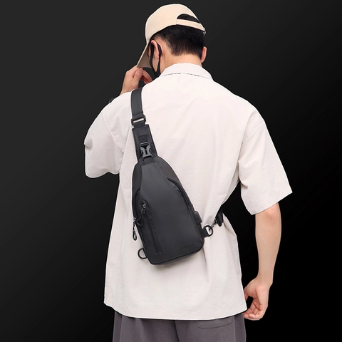 Herren Brusttasche Wasserdicht Oxford Umhängetasche Sling Rucksack Mit USB Ladeanschluss Trendig Lässig Sport Reisen