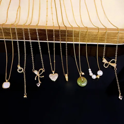 Damen Zirkon Schleife Herz Anhänger Halskette Vergoldet Kupfer Modeschmuck Elegante Verstellbare Schlüsselbeinkette