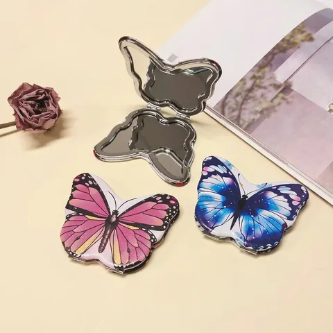 Miroir De Maquillage Pliant En Forme De Papillon Miroir De Poche Portable Double Face Compact Alliage De Zinc PU Pour Femmes