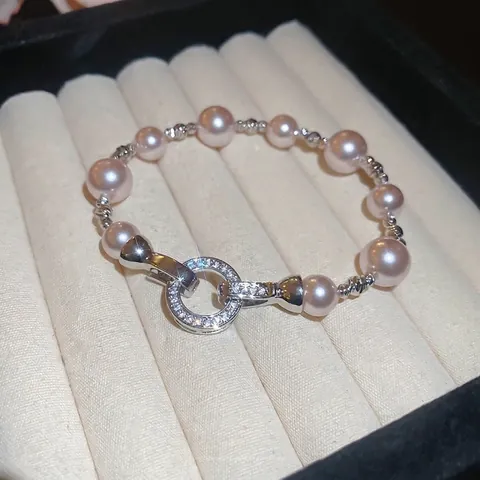 Bracelet Künstliche Perle Pour Femme Style Rétro Français Élégant Cuivre Zircon Fermoir Rond Bijou Mode Cadeau