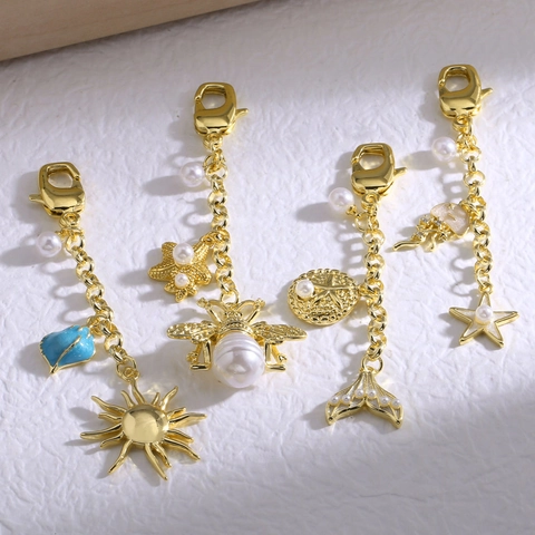 Porte-Clés En Cuivre Plaqué Or Soleil Abeille Coquillage Künstliche Perle Pendentif De Sac Accessoires Élégants Pour Femmes