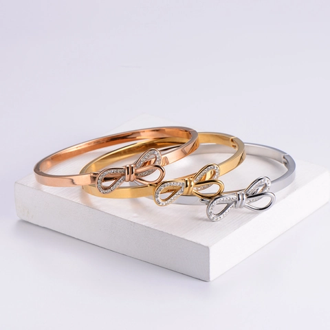 Bracciale Rigido Con Fiocco Per Donna Acciaio Inossidabile 316L Placcato Oro 18K Con Fiocco Di Strass Regalo Di Natale