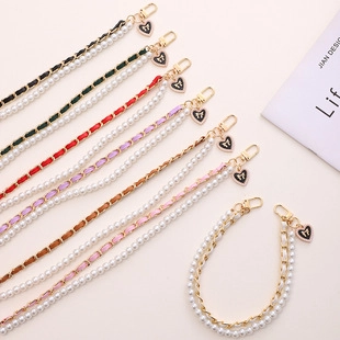 Élégante Chaîne de Téléphone Tissée en Cuir et Perles Artificielles Pendentif Cœur Nœud pour Femme Accessoires Mobiles
