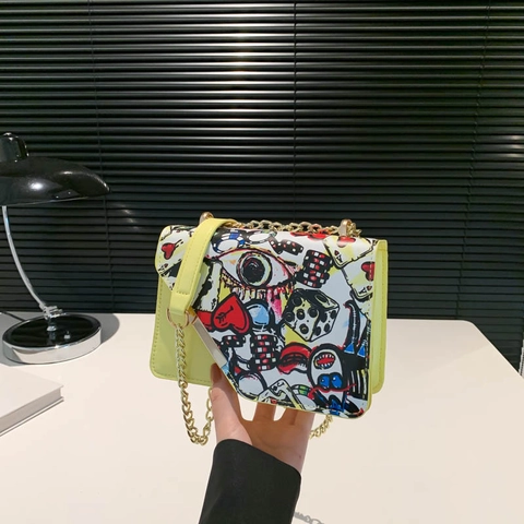 Damen Crossbody Tasche Mit Graffiti Print PU Leder Pop Art Stil Kleine Quadratische Umhängetasche Mit Goldener Kette