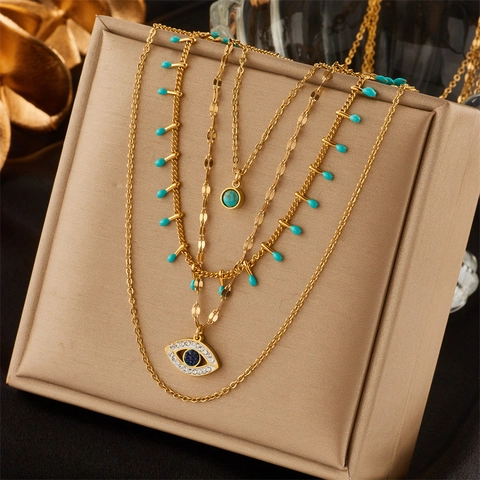 Lussuosa Collana Multistrato in Acciaio al Titanio Placcato Oro Malocchio Pendente in Turchese Artificiale Gioielli Donna