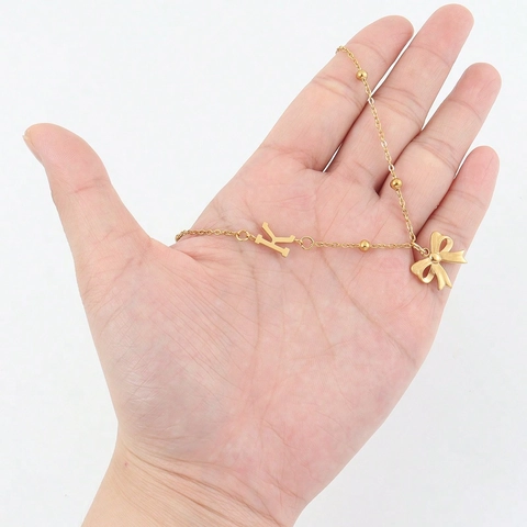 Collana Con Pendente Lettera Iniziale E Fiocco Farfalla Acciaio Inossidabile Placcato Oro 18K Gioielli Da Donna