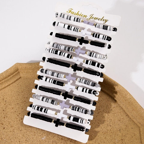 Böhmische Bunte Polymer-Ton Heishi-Perlenarmbänder Harz-Kreuz-Anhänger Legierungs-Abstandshalter Strand Elastischer Schmuck Damen
