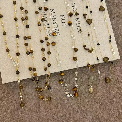 Collier Künstliche Perles Oeil De Tigre Rétro Femme Multicouches Collier Pull Long Avec Pendentif Coeur Feuille Künstliche Perle Bijoux