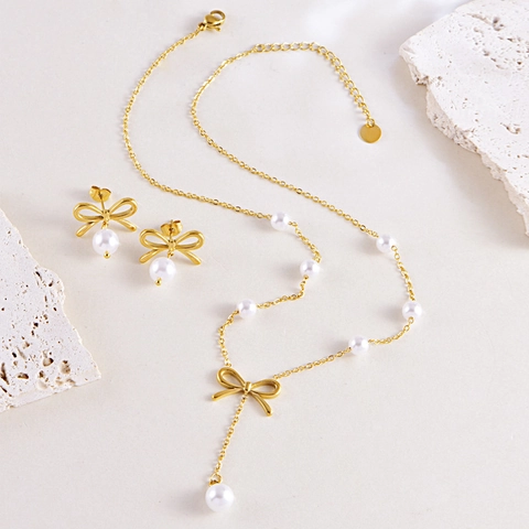 Collana E Orecchini Con Fiocco Elegante Acciaio Inossidabile Placcato Oro Perla Artificial Sintetica Nappa Per Donna