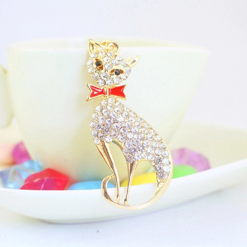 Simpatico Portachiavi a Forma di Gatto con Strass in Lega di Zinco Oro Ciondolo Animale con Fiocco Rosso in Smalto Gioielli da Donna
