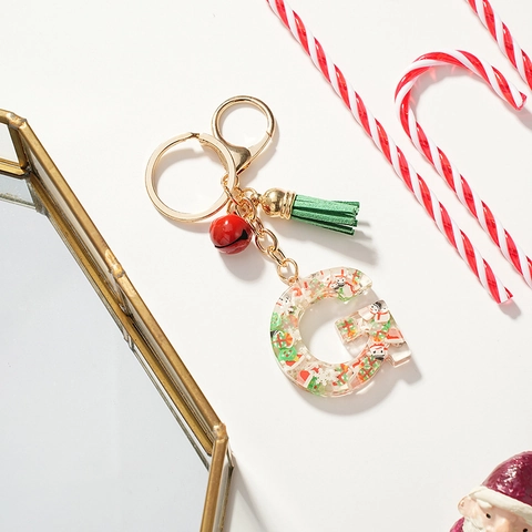 Weihnachts-Initial Buchstabe G Schlüsselanhänger Transparentes Harz Mit Roter Glocke Grüner Quaste Feiertags-Taschenanhänger