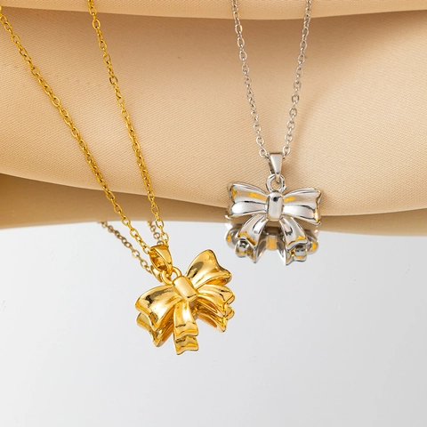 Squisita Collana con Pendente a Fiocco per Donna in Acciaio al Titanio Placcato Oro Argento Dolce Elegante Catena da Clavicola