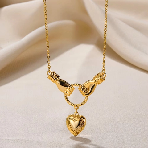 Collana con Ciondolo Vintage in Acciaio Inossidabile Placcato Oro Malocchio Cuore Croce Teschio Strass Mano di Fatima Ankh per Donna Uomo