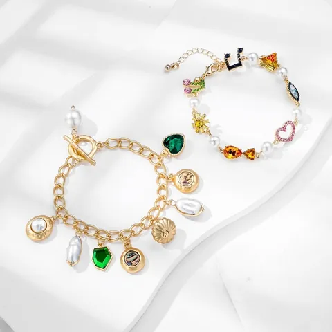 Bracciale in Lega di Zinco con Perle Artificiali e Strass Donna Retro Oro Malocchio Cuore Conchiglia Pendente Fibbia OT