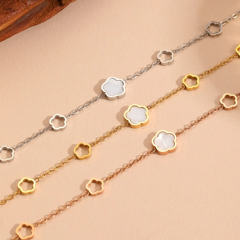Pulsera De Flores Huecas De Acero Inoxidable Para Mujer Con Incrustaciones De Concha Blanca Joyería De Moda No Se Desvanece