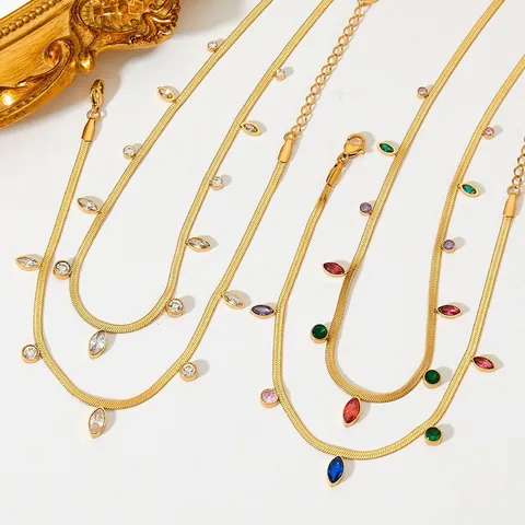 Pulsera De Tobillo Para Mujeres Estilo De Borla De Zirconia Ovalada Súper Brillante Cadena Plana De Acero Inoxidable Joyería De Pie En Oro De Horno