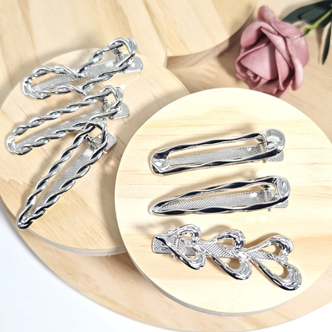 Damen Haarspangen Metall Hohllegierung Herz Schleife Geometrisch Pony Seitenhaarnadeln Elegant Süßer Cooler Stil Haarschmuck
