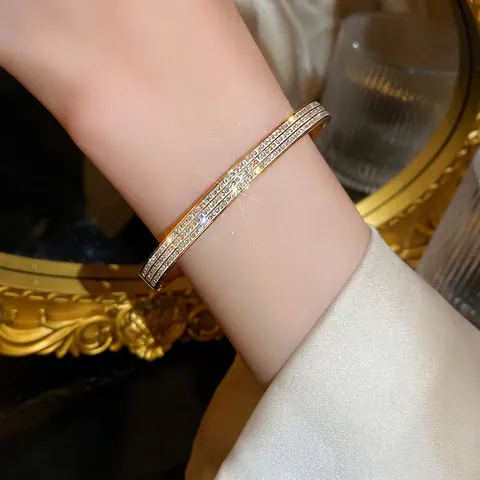 Gold Plated Copper Bangle Bracelet With Sparkling Zircon Micro Pave Square Main Stone Buckle Clasp Light Luxury Elegant Jewelry