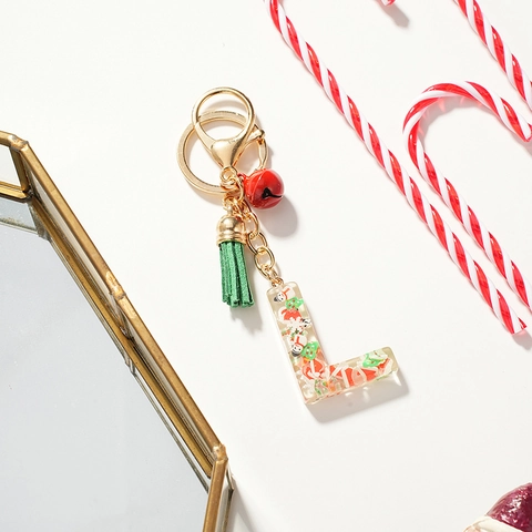 Portachiavi Lettera Dell'Alfabeto Di Natale L Ciondolo In Resina Con Paillettes Pupazzo Di Neve Campanello Di Metallo Nappa Verde