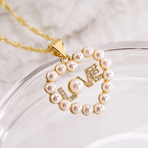 Collana Con Ciondolo A Cuore Rame Placcato Oro Zircone Madreperla Perla Artificial Donne Lusso Leggero Retro Stile INS Catena