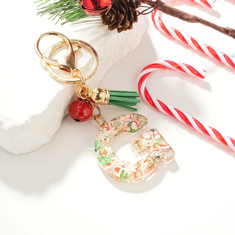Weihnachts-Initial Buchstabe G Schlüsselanhänger Transparentes Harz Mit Roter Glocke Grüner Quaste Feiertags-Taschenanhänger