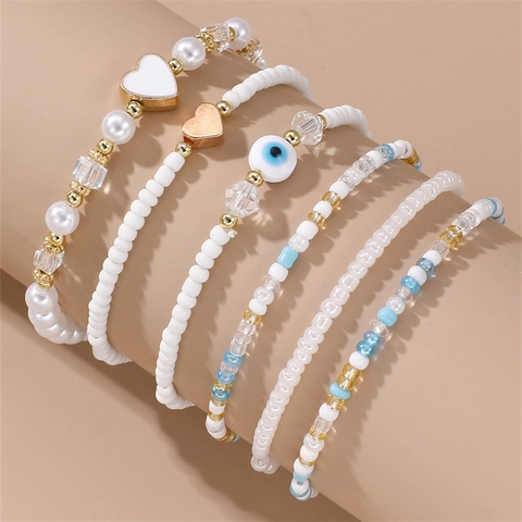 Bracelets Multicouches Bohèmes En Künstliche Perles De Rocaille Imitation Künstliche Perle Mauvais Œil Pendentif Cœur Bijoux Élastiques Pour Femmes