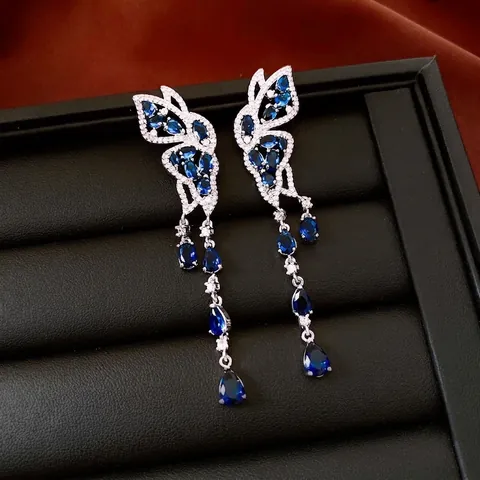 Orecchini Pendenti Con Nappa Lunga Ala Di Farfalla Cava Zircone Blu Bianco Rame Con Perno In Argento Per Donne