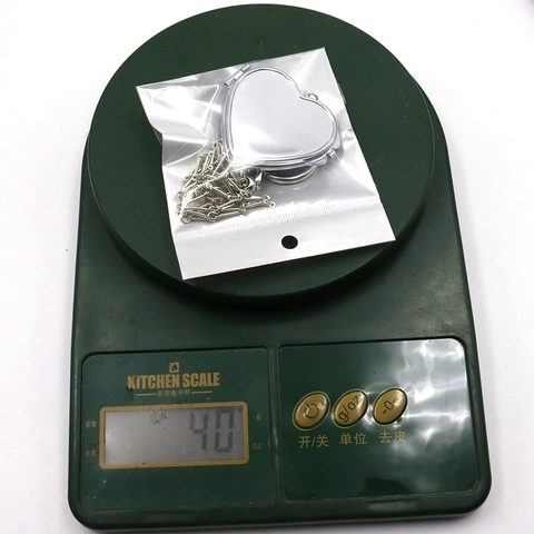Metall Schlüsselanhänger Mit Herz Oval Medaillon Spiegel Schleife Und Langer Quaste Lippenstifthalter Modischer Taschenanhänger