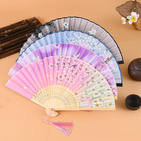Vintage Chinese Style Folding Hand Fan Bamboo Bone Satin Fabric Surface Hollow Carved Floral Tassel For Dance Gift Decoration