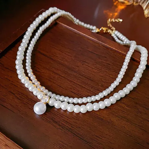 Collana Künstliche Perle Doppio Strato Ciondolo Zirconia Lusso Vintage Catena Clavicola Choker Pelliccia Bianca Fiocco Donne