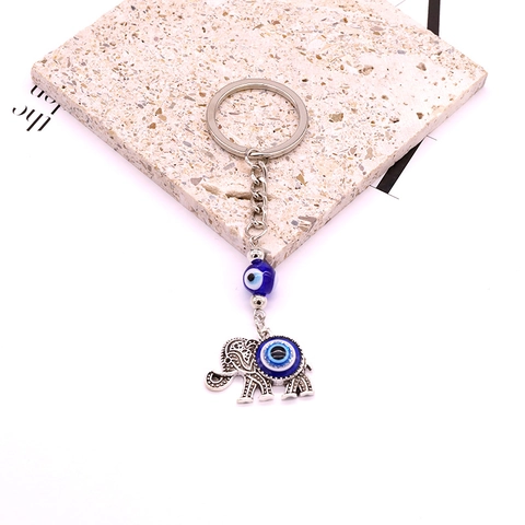 Porte-clés Rétro Style Ethnique Argent Antique Éléphant Dauphin Avec Charme Œil de Mauvais en Résine Décoration Animal Femme Homme
