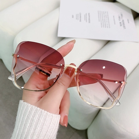 Occhiali Da Sole Senza Montatura Oversize Donna Sfumati Farfalla Moda Protezione UV Guida Eyewear