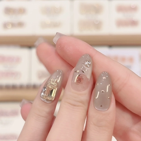 Faux Ongles Faits Main French Cat Eye 3D Rose En Résine Noeud En Alliage Strass Künstliche Perle Long Cercueil Ovale Élégant