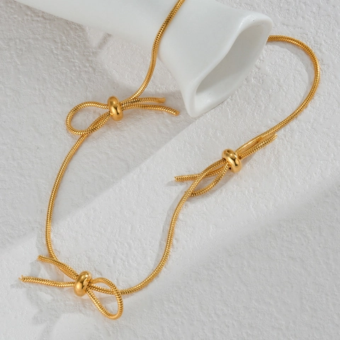 Collier Pendentif Nœud en Acier Inoxydable Minimaliste pour Femmes Plqué Or 18K Chaîne Serpent Ras du Cou Bijoux de Création de Niche