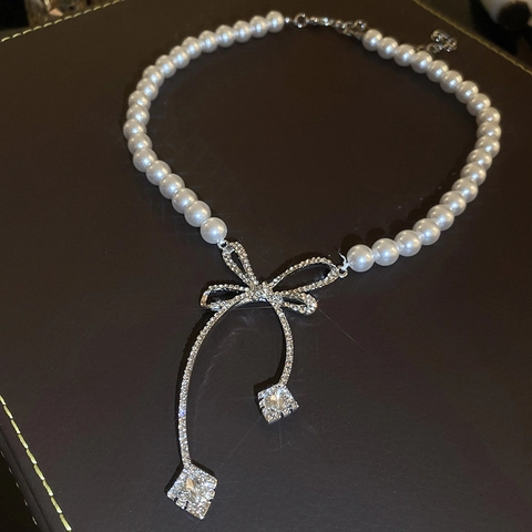 Elegante Collana Girocollo Con Künstliche Perle Sintetiche Fiocco Lega Strass Dolce Catena Di Clavicola Per Donna