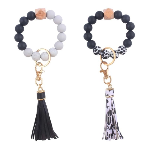 Portachiavi da Polso con Perline in Silicone per Donna Moda Nappa in Pelle PU Bracciale con Perla in Legno Regalo Accessorio