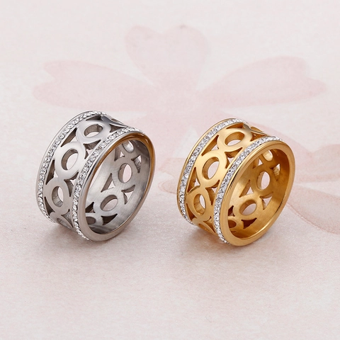 Anillo De Banda Hueca De Acero De Titanio Circonita Pavimentada Diamante De Imitación Diseño Circular Geométrico Joyería