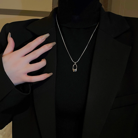 Minimalist Titanium Steel Necklace With Hollow Geometric Oval Pendant And Snake Chain For Women Elegant Accessory