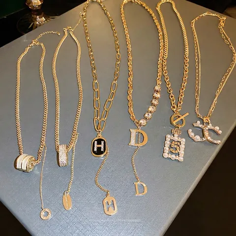 Knebelverschluss Anhänger Halskette Legierung Zirkon Künstliche Perle Blume Geometrisch Eingelegt Elegante Lange Pulloverkette Für Damen