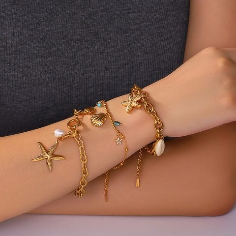 Bracciale in Acciaio Inossidabile a Tema Oceano per Donna Placcato Oro Conchiglia Stella Marina Perla Artificiale Gioielli