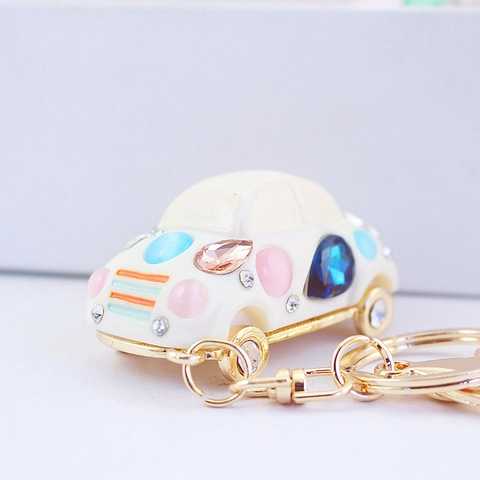 Simpatico Portachiavi a Forma di Auto con Strass in Lega di Zinco Perla Artificiale Ciondolo per Borsa Auto Cartone Animato Regalo