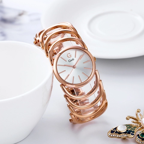 Orologio al Quarzo da Donna di Moda in Lega Cinturino a Bracciale ad Anello Cavo Rotondo Resistente all'Acqua Regalo