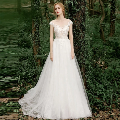 Robe De Mariée Épaules Dénudées Applique Dentelle Traîne Tulle Élégant Style Forêt Robe De Mariée Femme Blanc
