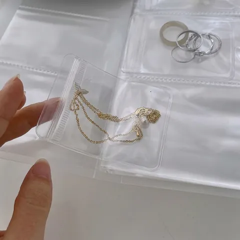 Borsa Porta Gioielli Portatile in PVC Trasparente Anti-ossidazione Organizzatore a Libro Sigillato per Collane Orecchini Anelli