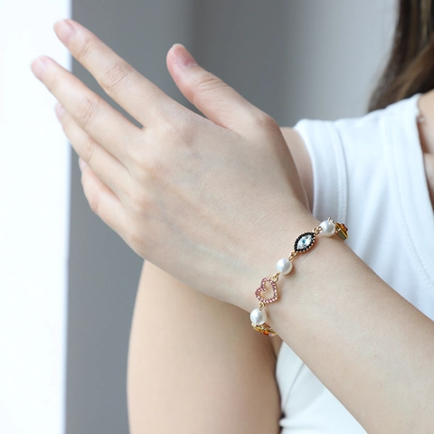 Bracciale in Lega di Zinco con Perle Artificiali e Strass Donna Retro Oro Malocchio Cuore Conchiglia Pendente Fibbia OT